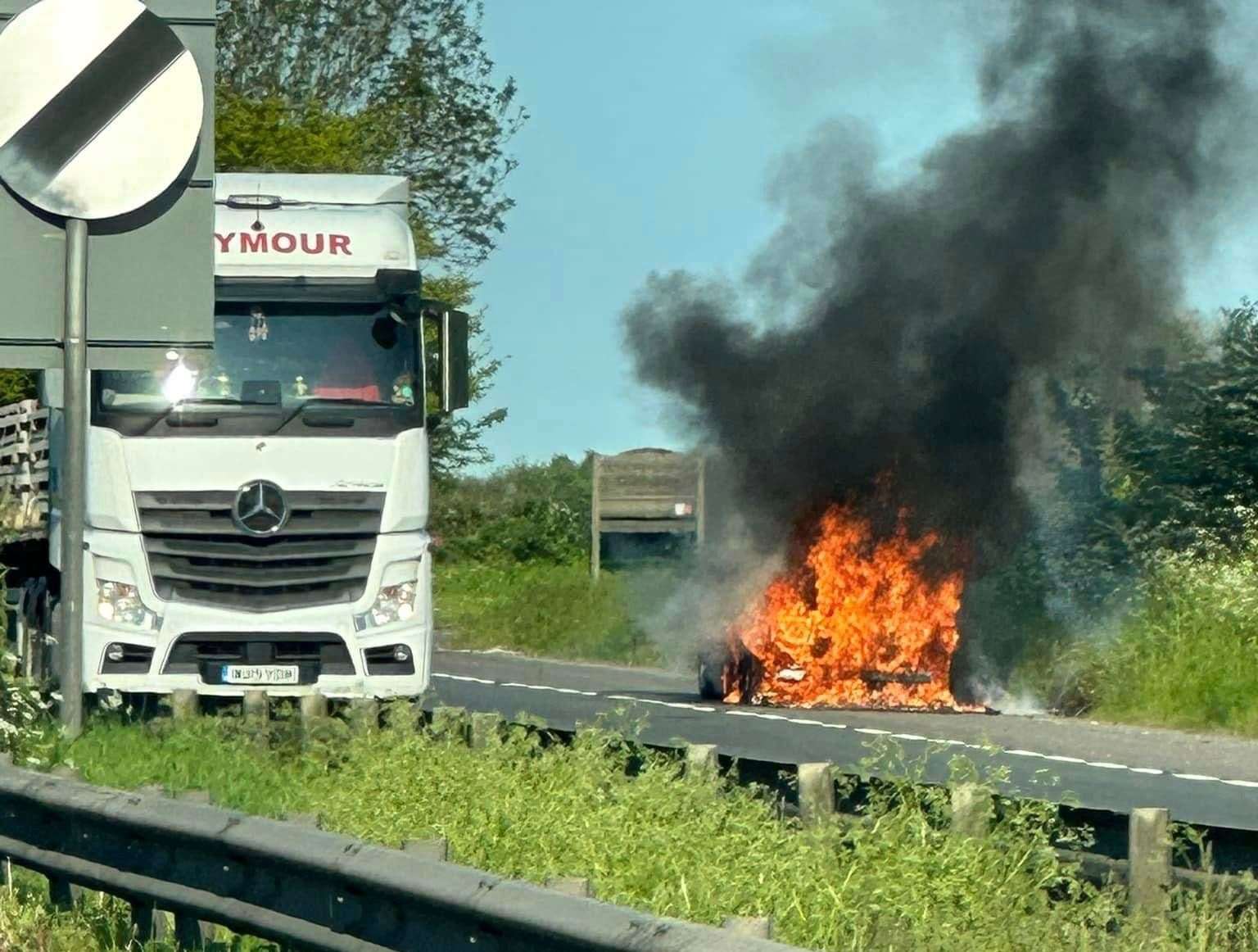 Drivers spotted a car on fire along the A249. Picture: Nikki Dodd