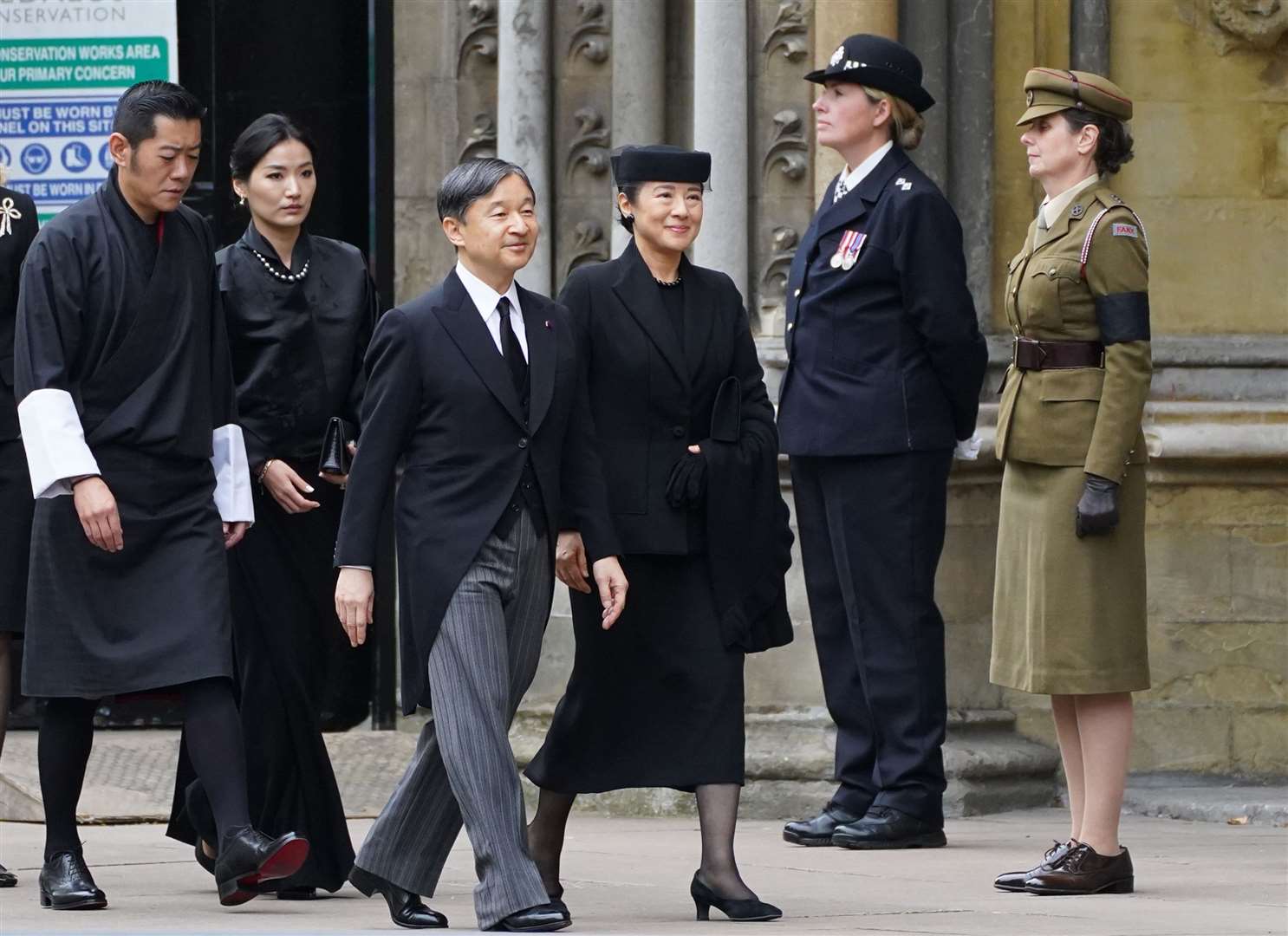 Emperor of Japan Naruhito and wife Empress Masako arrive at the Queen’s state funeral at Westminster Abbey (James Manning/PA)