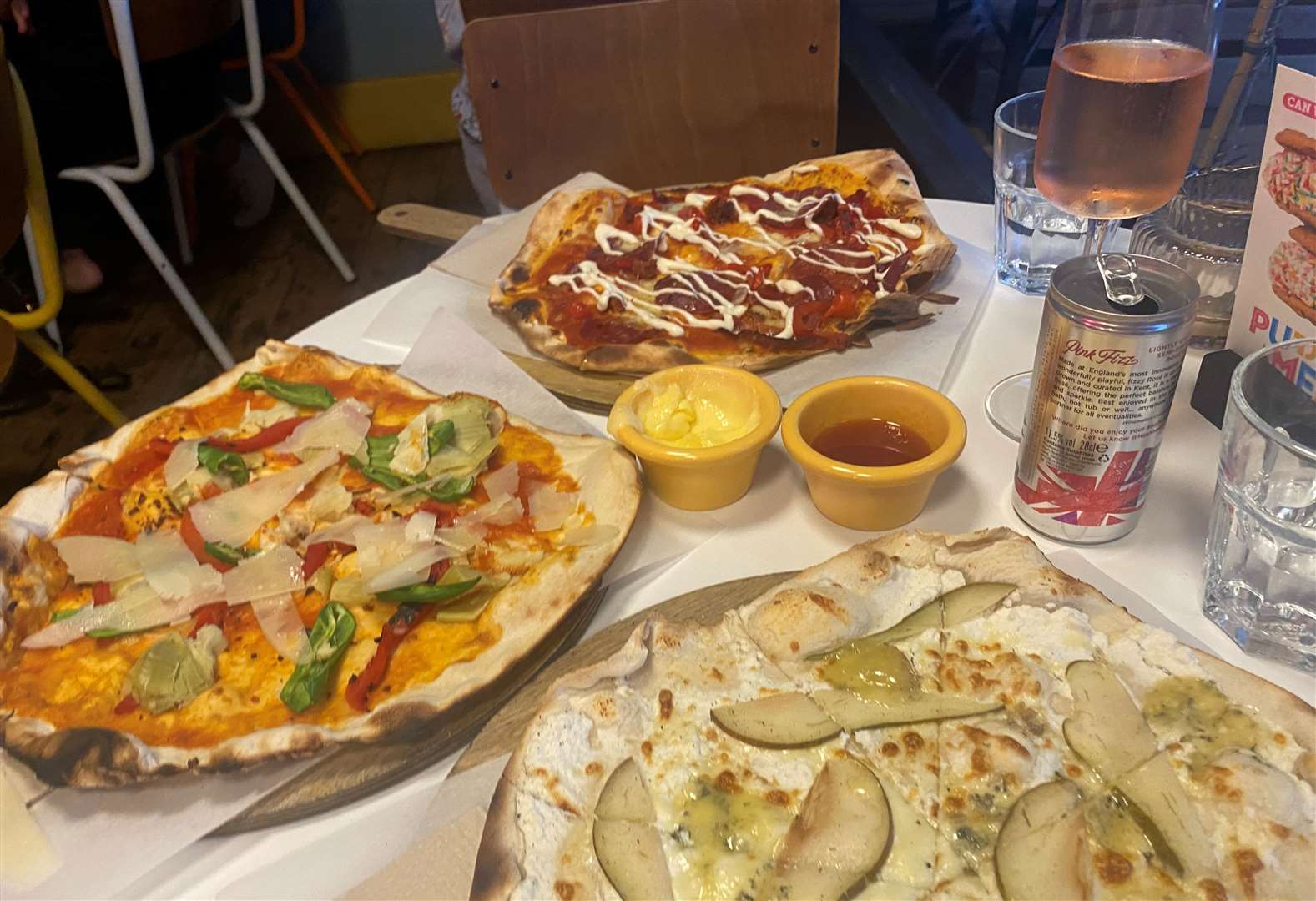 The trio of pizzas we tasted at GB Pizza with the garlic butter and sriracha honey dips