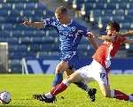 Leigh Mills is tackled by Aaron Taylor. Picture: Grant Falvey