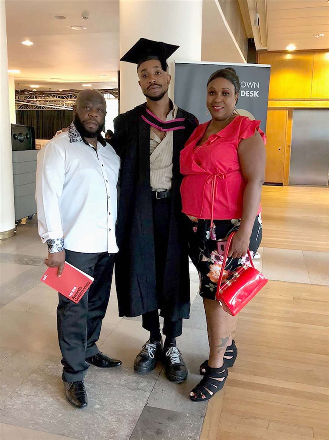 Thomas Harvey with his wife Marcia at the graduation of Thomas Harvey Junior (Family handout/PA)