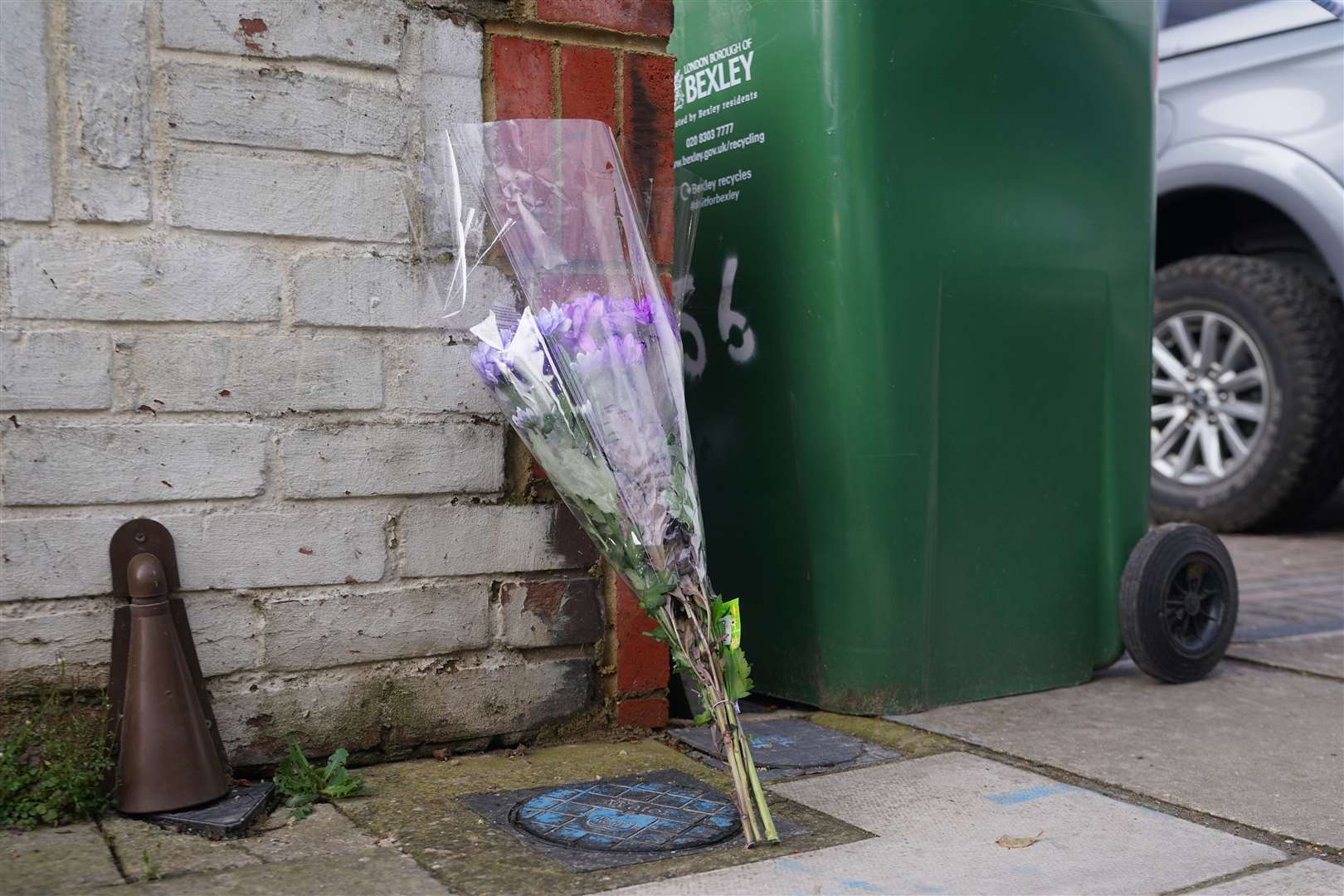 Flowers were left at the property on Friday (Yui Mok/PA)