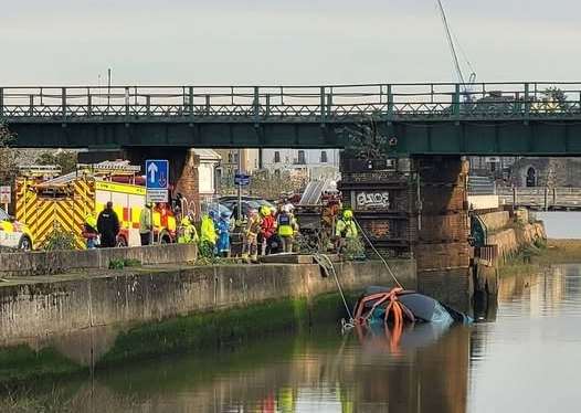 The car is being recovered from the water. Picture: Eugenia Rim