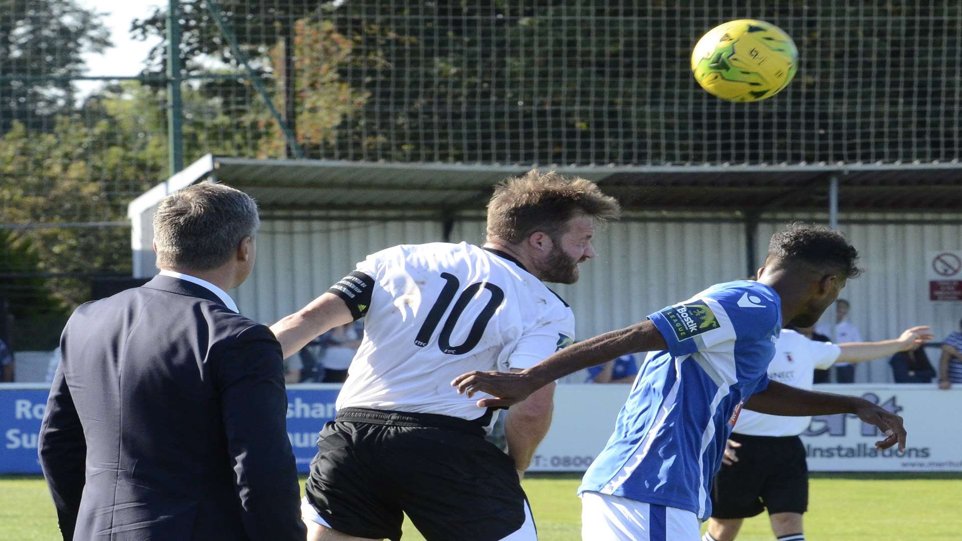 Faversham's Mark Lovell wins a header against Tonbridge on Saturday. Picture: Chris Davey