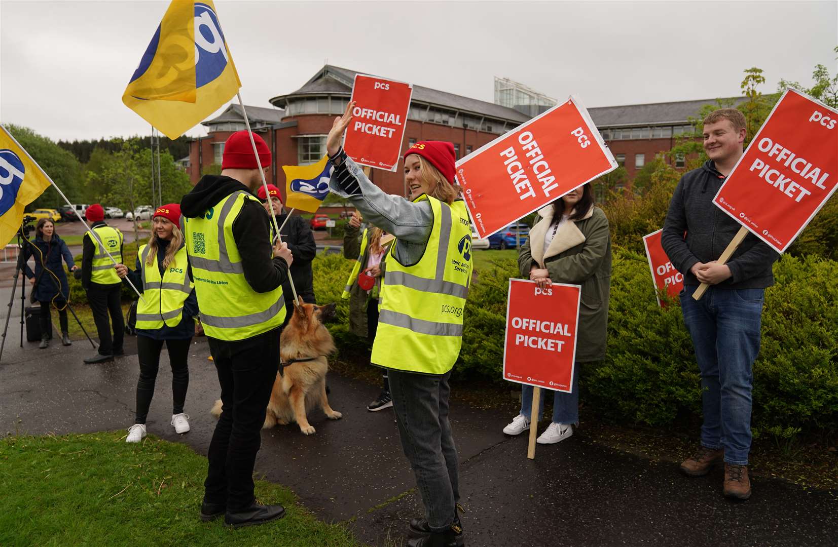 PCS members on strike outside the HMRC offices in East Kilbride (Andrew Milligan/PA)