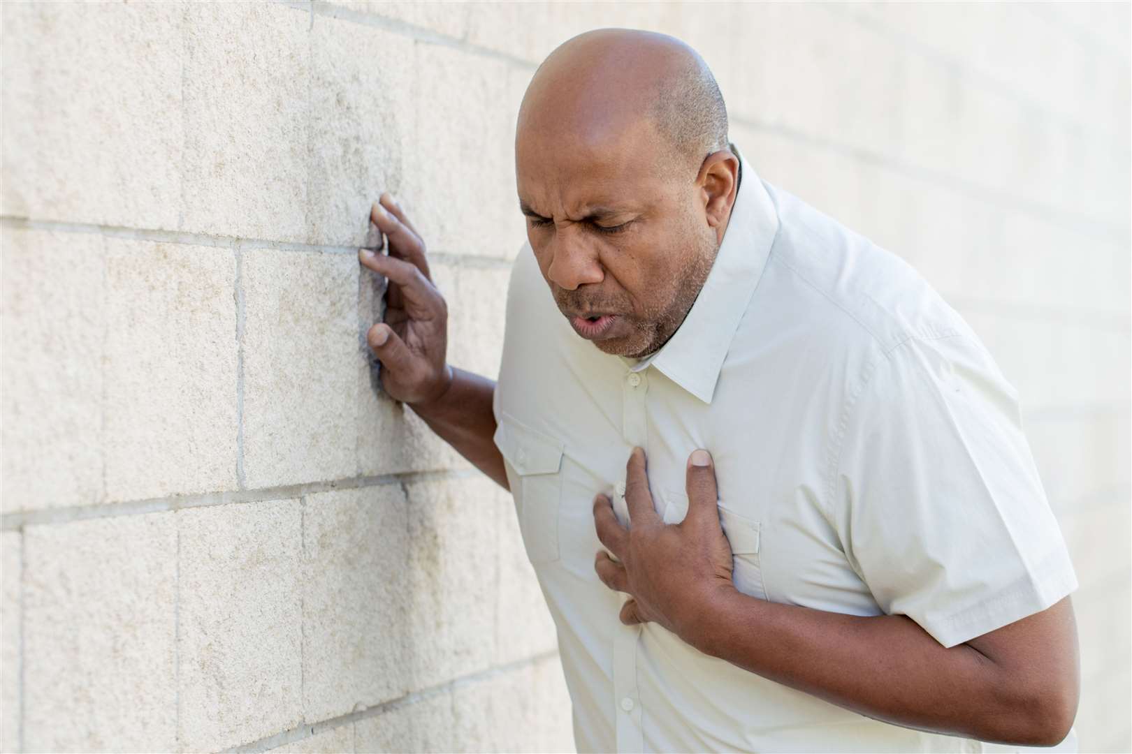 Man holding his chest. Picture: Stock