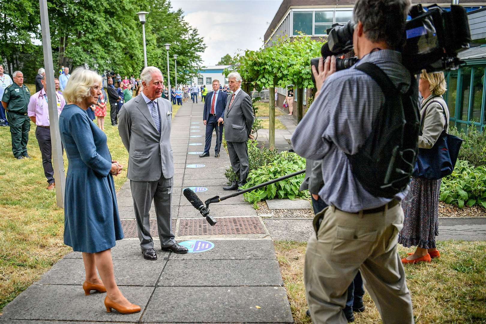 Charles and Camilla conduct a socially-distanced TV interview (Ben Birchall/PA)