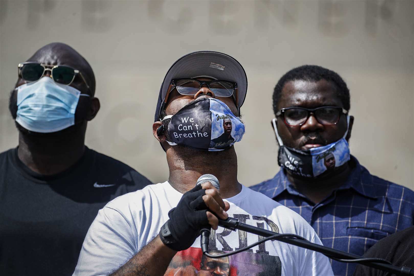 George Floyd’s brother, Terrence, speaks to a crowd during a rally in Brooklyn, New York (John Minchillo/AP)