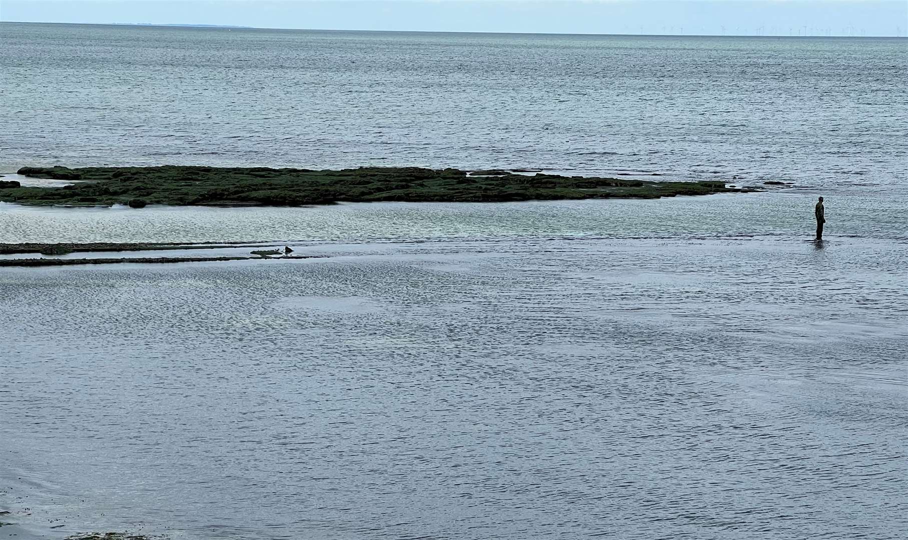 The Antony Gormley statue in front of the Turner stands on the foundation of the old pier