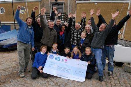 Members of the Isle of Sheppey Sailing Club celebrate winning a grant of more than £40,000