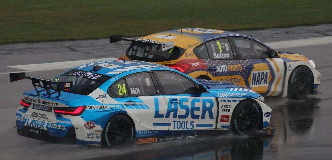 Jake Hill does battle with last season's BTCC champion Ash Sutton at Silverstone. Picture: Jakob Ebrey/BMW