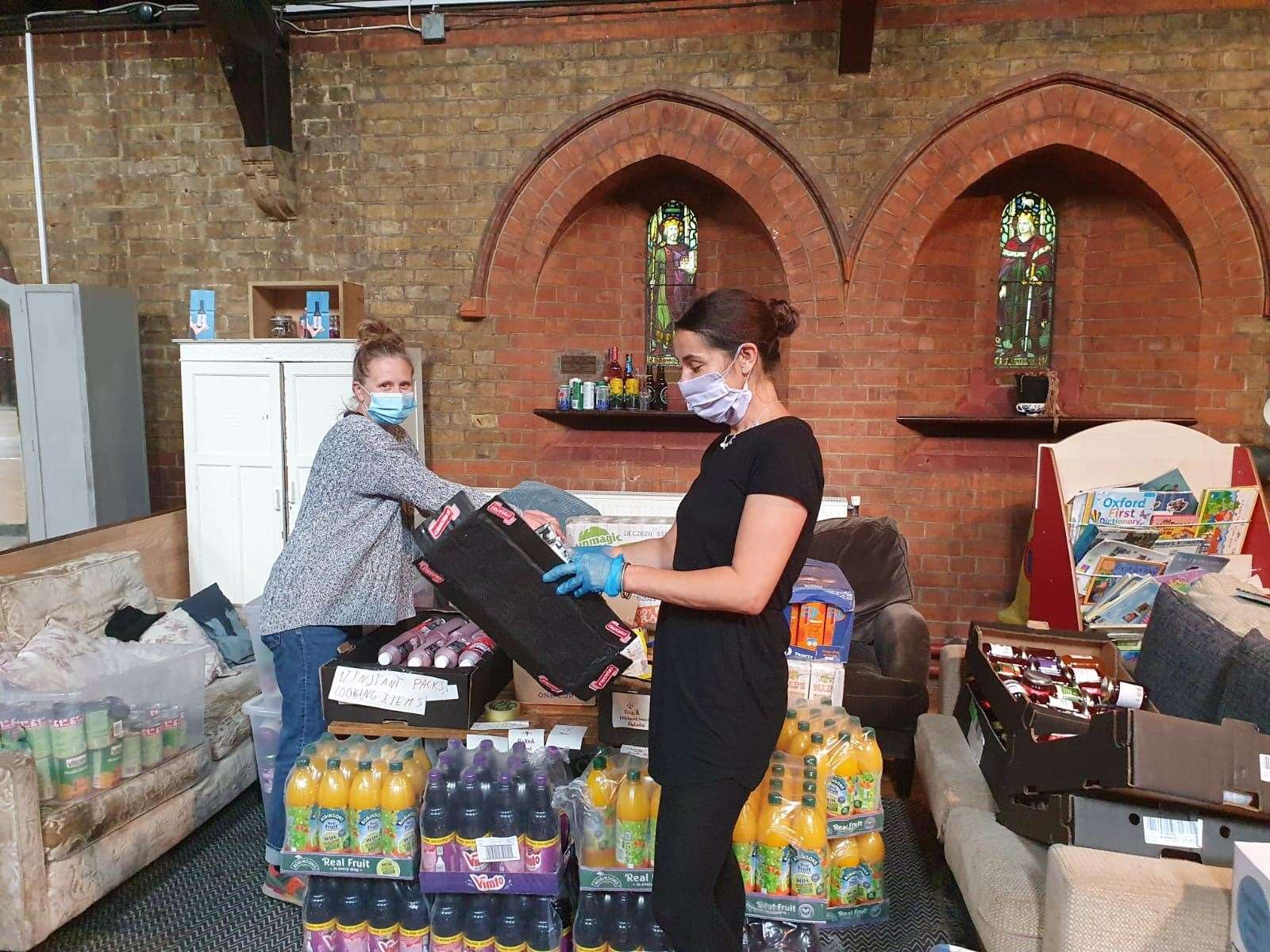 Volunteers working at a food bank in Earlsfield, south London (Charlotte White/PA)