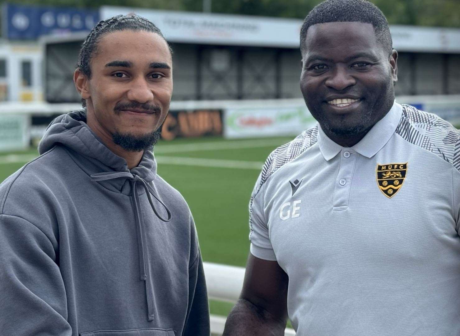 Maidstone United manager George Elokobi, right, welcomes new signing Aaron Blair. Picture: MUFC