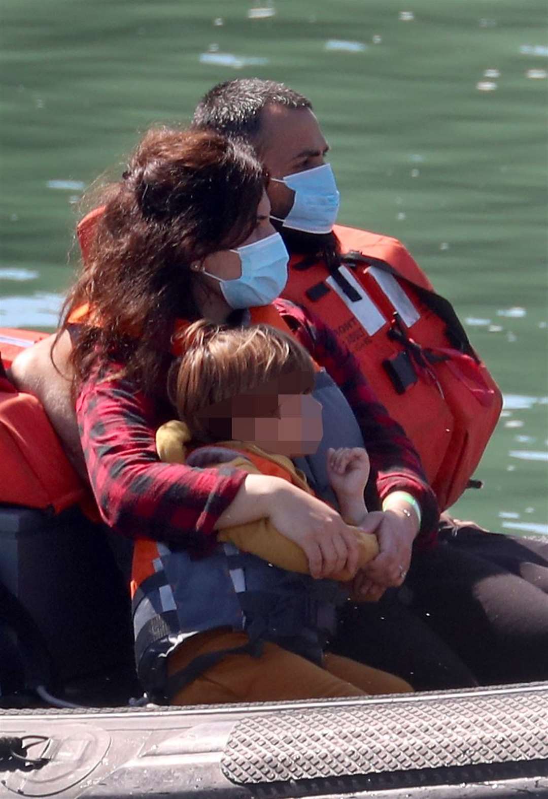 A Border Force vessel brings a group of people thought to be migrants into Dover (Gareth Fuller/PA)