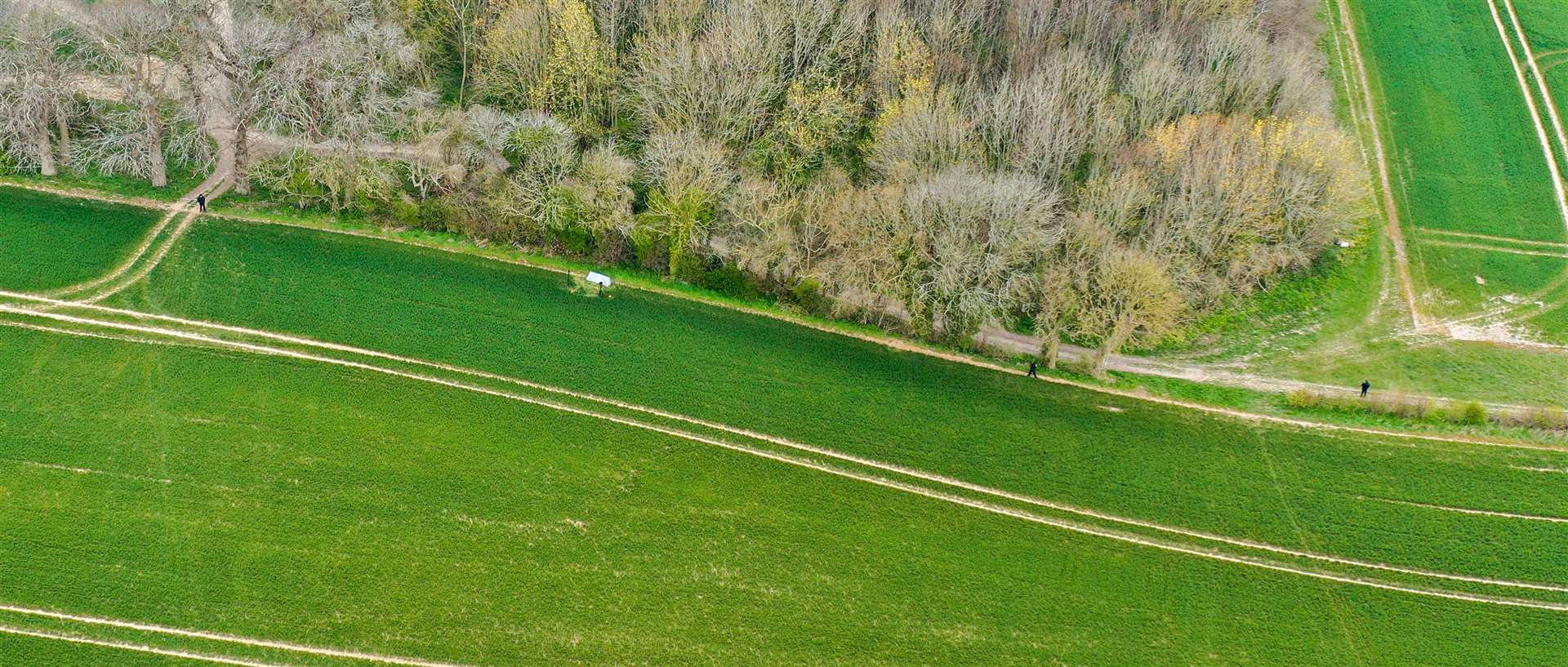 An aerial shot of a police tent in a nearby field Picture: UKNIP
