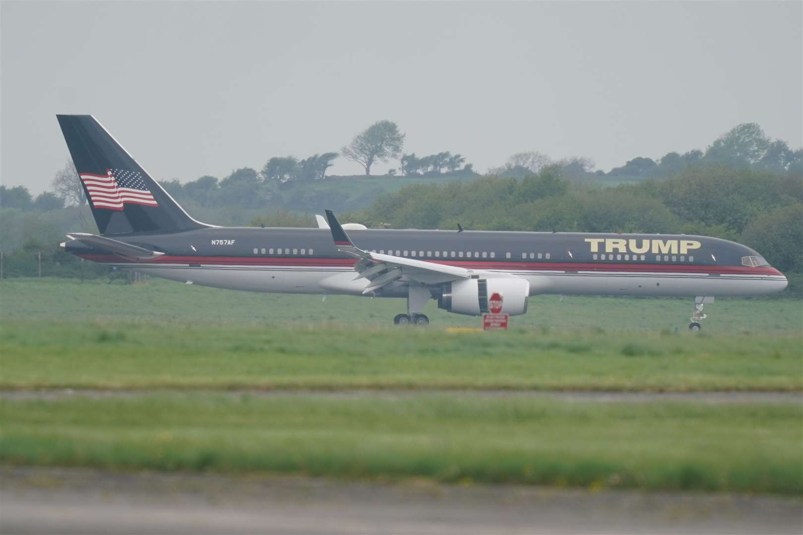 Former US president Donald Trump arrives in his private jet at Shannon Airport in Co Clare, before heading to Trump International Golf Links & Hotel in Doonbeg (Niall Carson/PA)