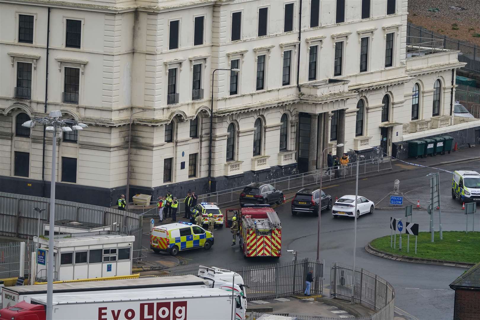 Emergency services near the migrant processing centre in Dover after a petrol bomb attack