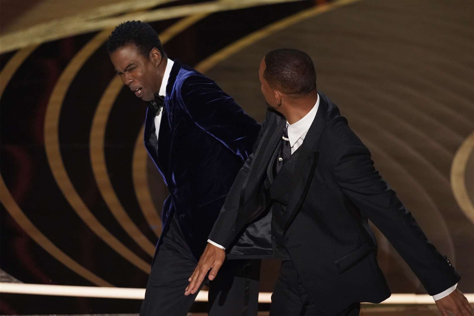 Will Smith confronts (Chris Pizzello/AP)