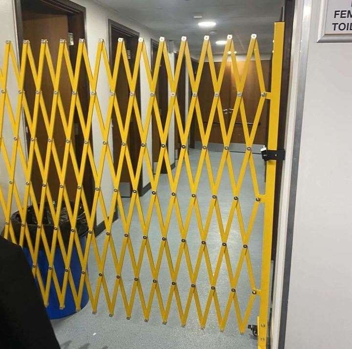 A yellow gate installed at a toilet block at Herne Bay High School