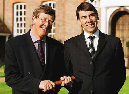 Geoffrey Dearing, former managing partner at Brachers, hands over the baton to John Sheath at a farewell function. Picture courtesy: ADAMS CREATIVE