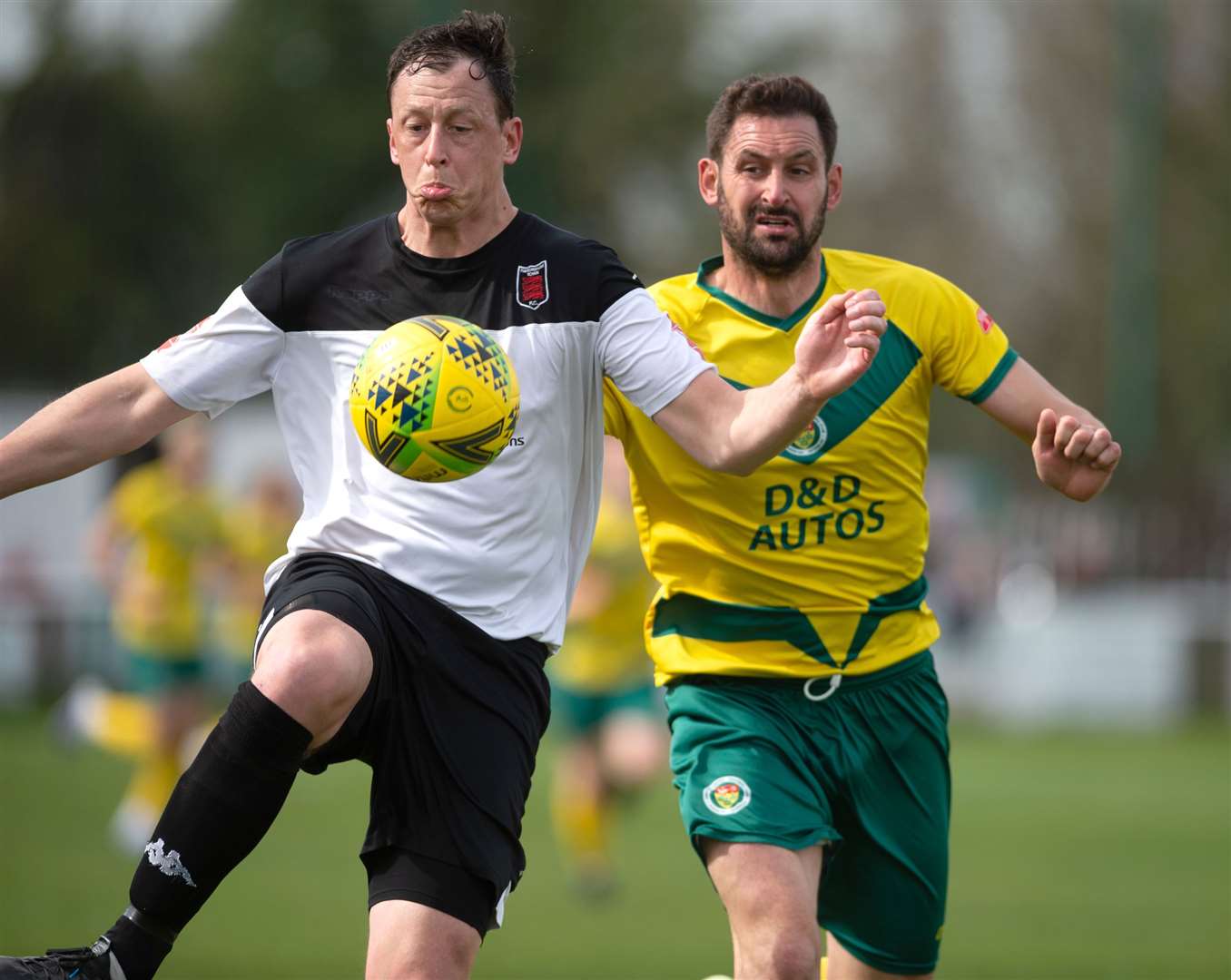 Jay May battles with Faversham's Matt Bourne on Easter Monday Picture: Ian Scammell