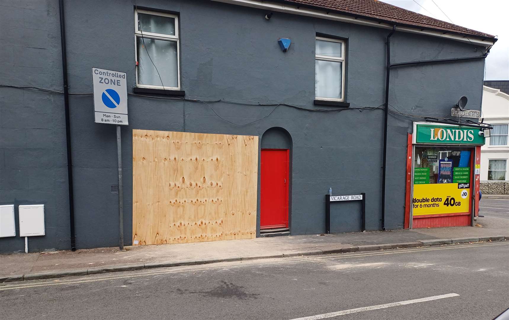 The wall of the building in Vicarage Road, Gillingham has been boarded up