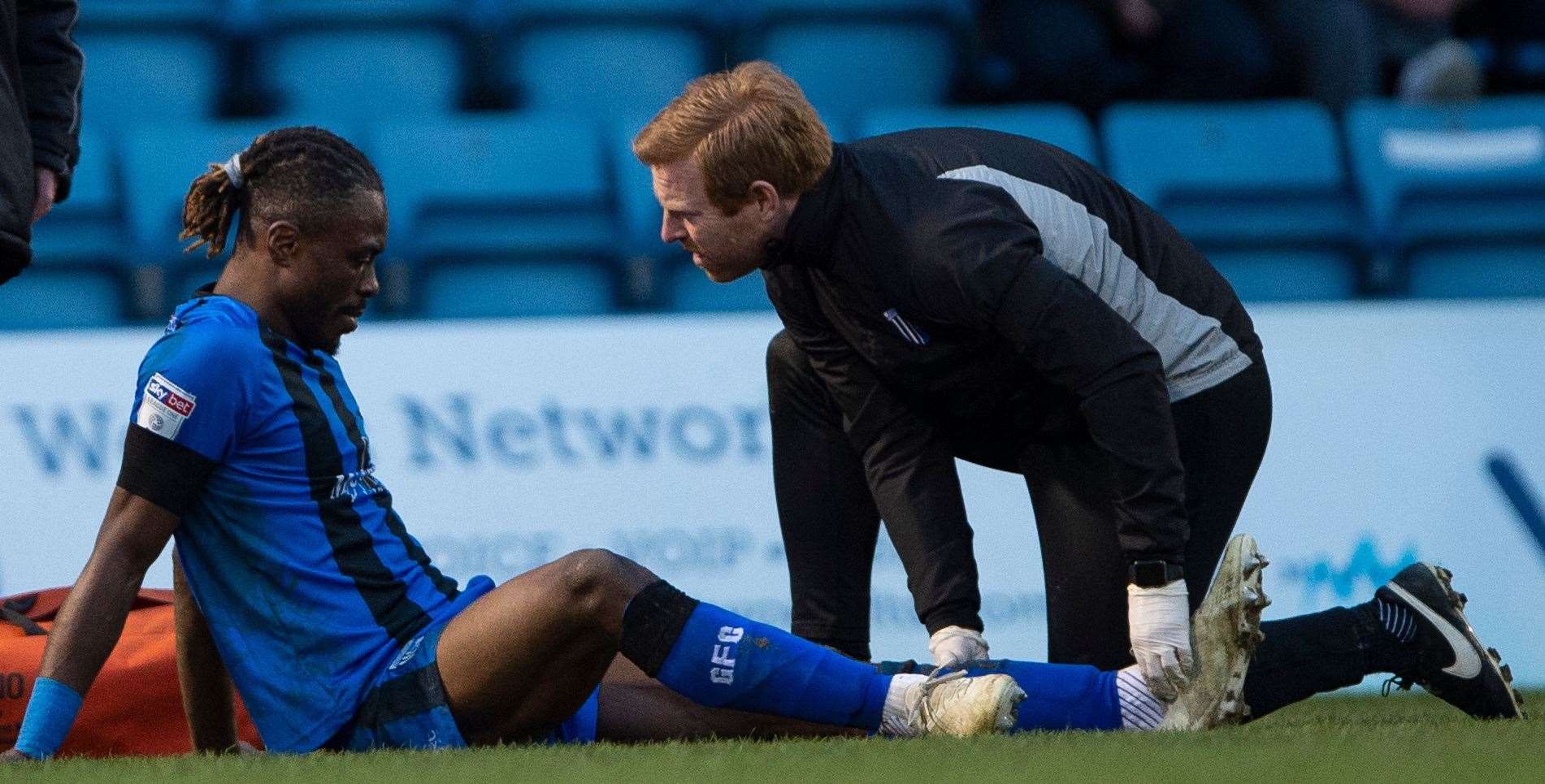 Gabriel Zakuani's ankle gets treatment during the match against Barnsley Picture: Ady Kerry