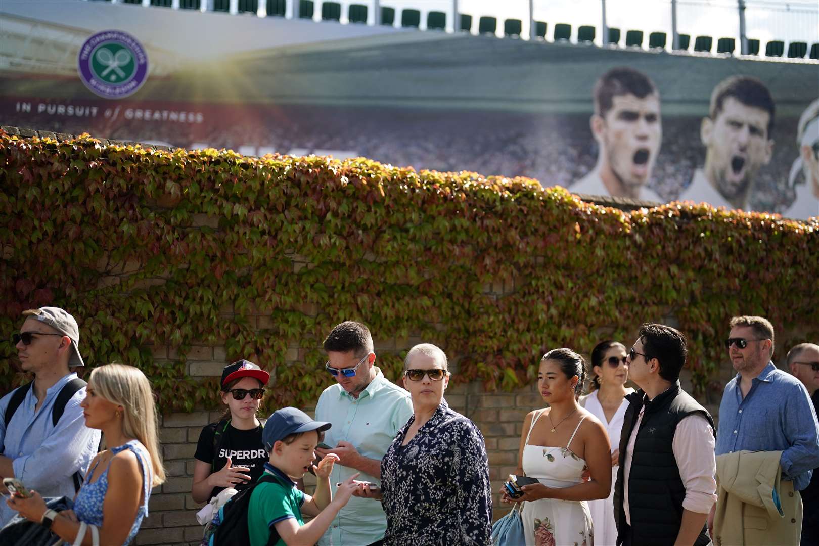 People queueing for the final day of the tournament (Victoria Jones/PA)