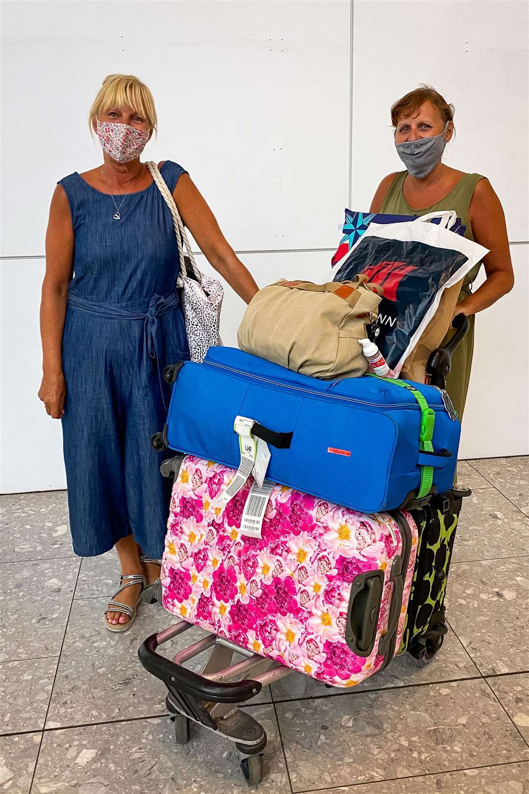 Sisters Dionne Emery and Karen Emery who flew via Italy back to London Heathrow Airport after visiting Croatia (Aaron Chown/PA)