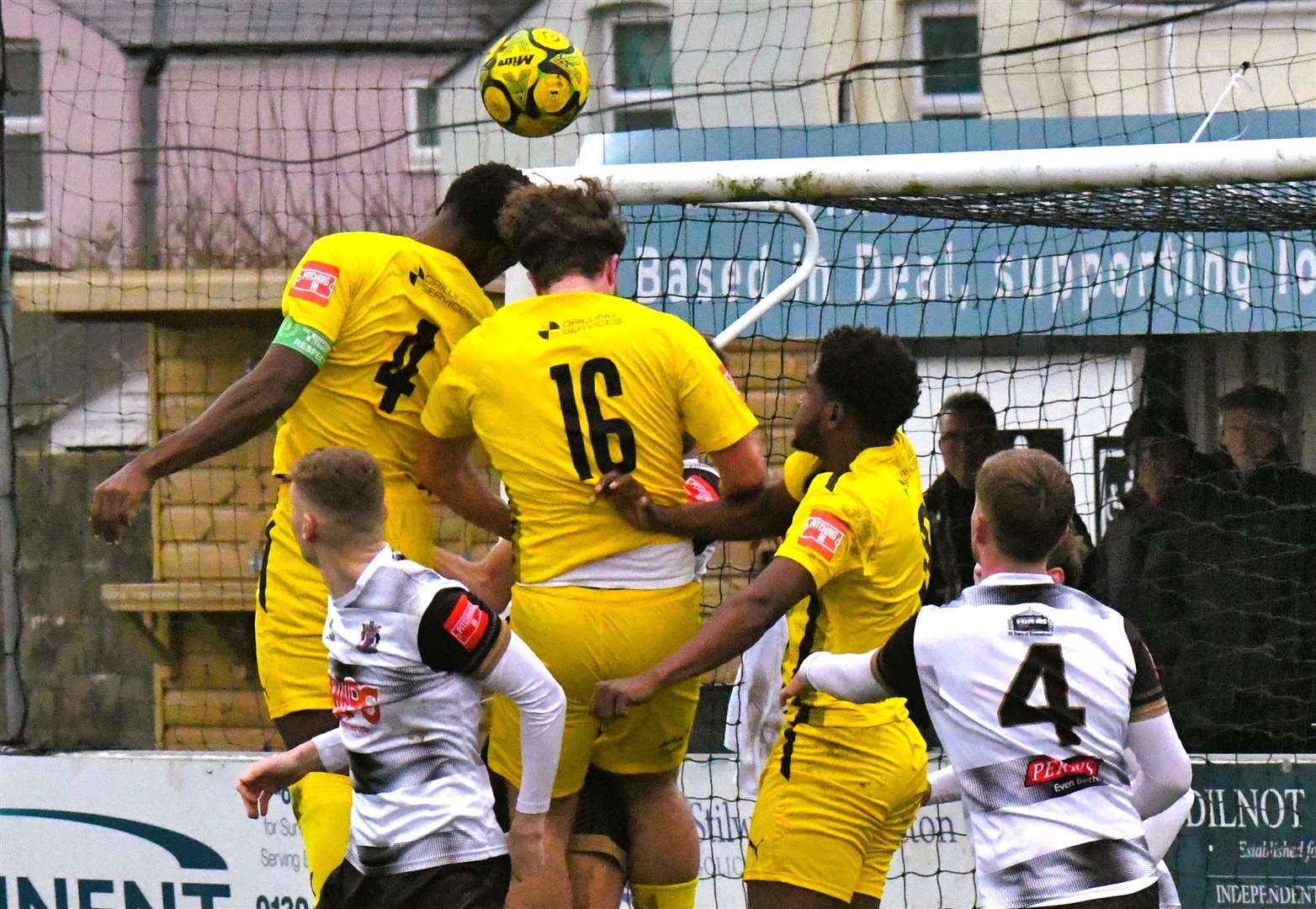 Lekan Majoyegbe (No.4) and David Johnson (No.16) try to head for goal for Sheppey United. Picture: Marc Richards