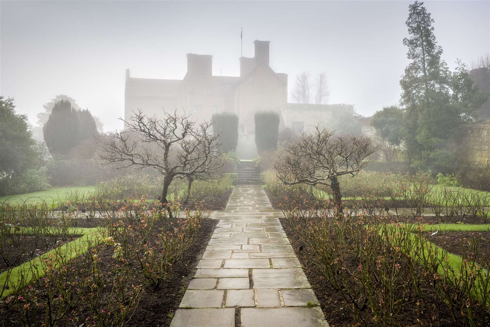 Chartwell looms in the background of its gardens - where Winston Churchill and his wife lived for many years. Picture: National Trust/Andrew Butler