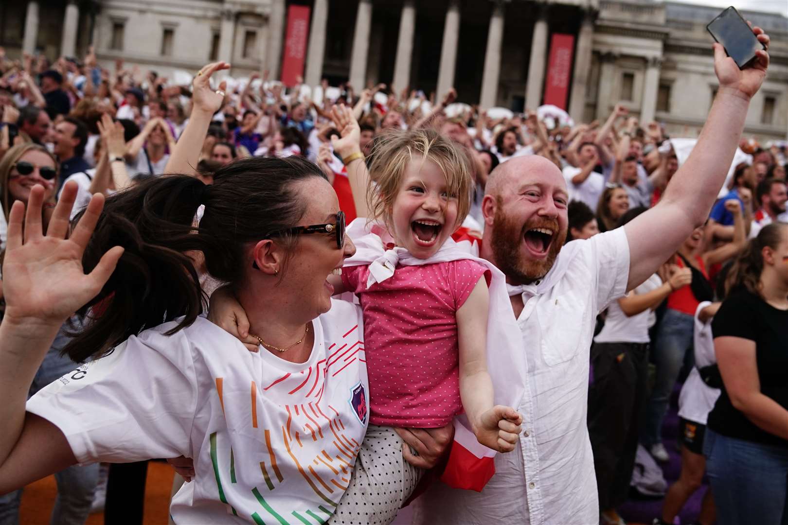 Fans in Trafalgar Square (Aaron Chown/PA) 