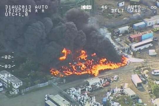 Police helicopter above Gravesend's tyre fire