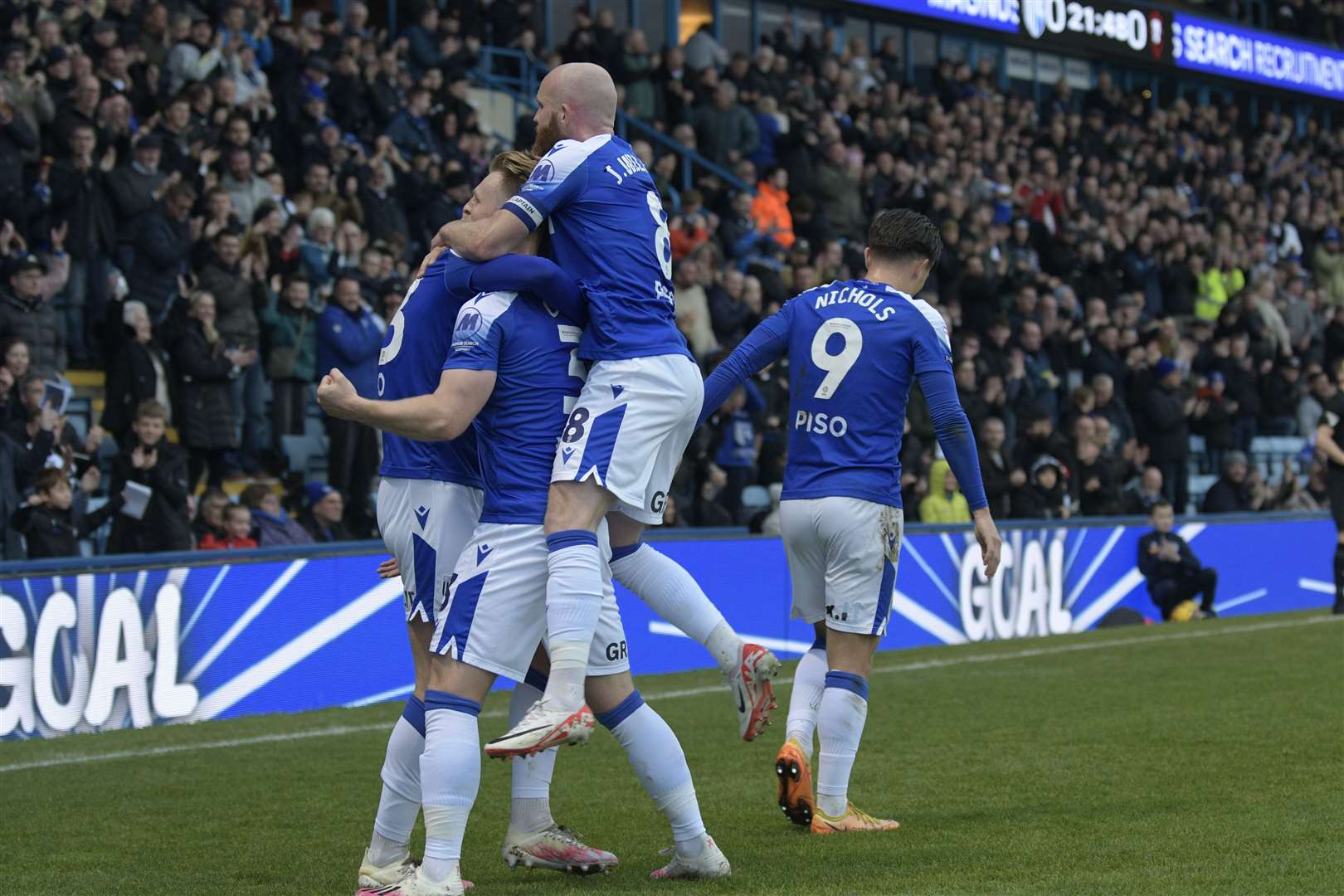 Gillingham players celebrate their opening goal on Saturday scored by Connor Mahoney Picture: Barry Goodwin