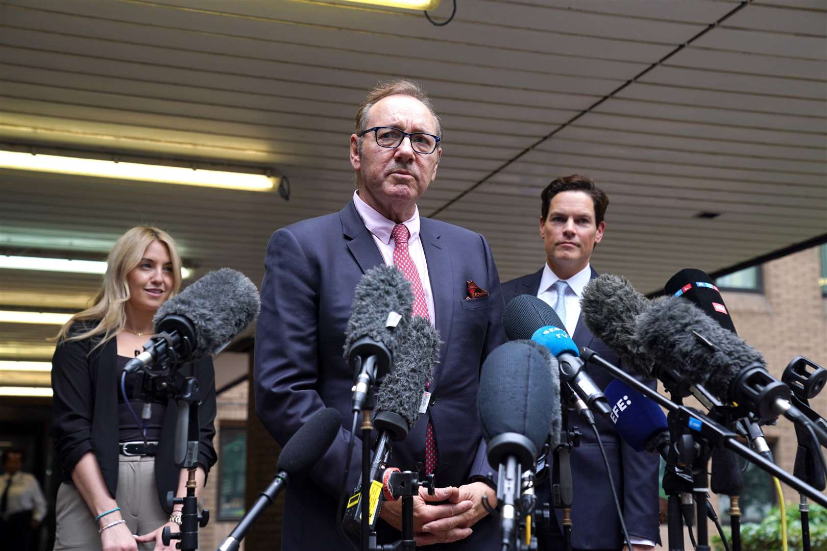 Actor Kevin Spacey speaks to the media outside Southwark Crown Court (Lucy North/PA)