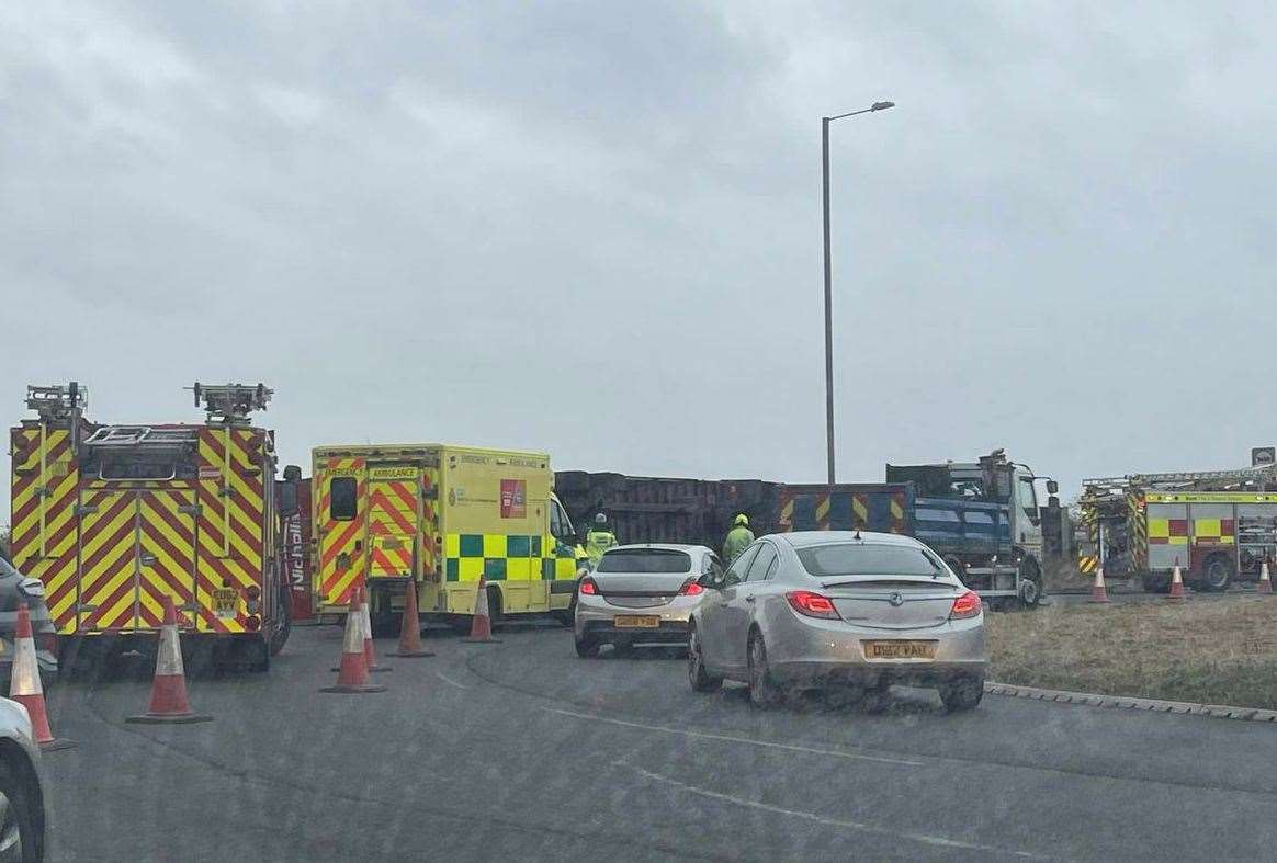 The overturned lorry at the roundabout on the A249 at Cowstead Corner. Picture: Dickie Carew