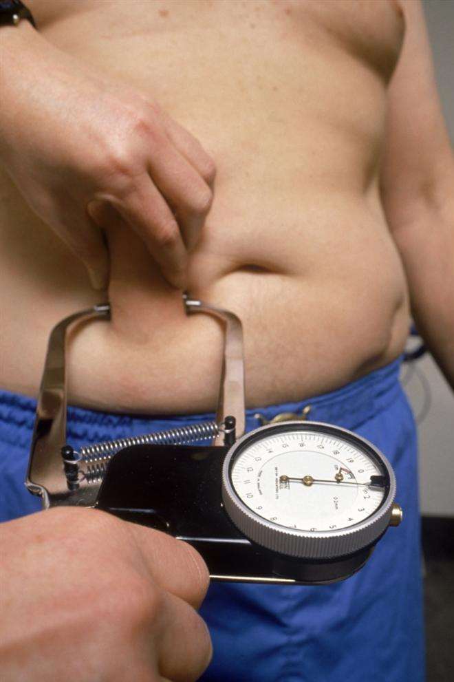 A child is tested for obesity. Stock image