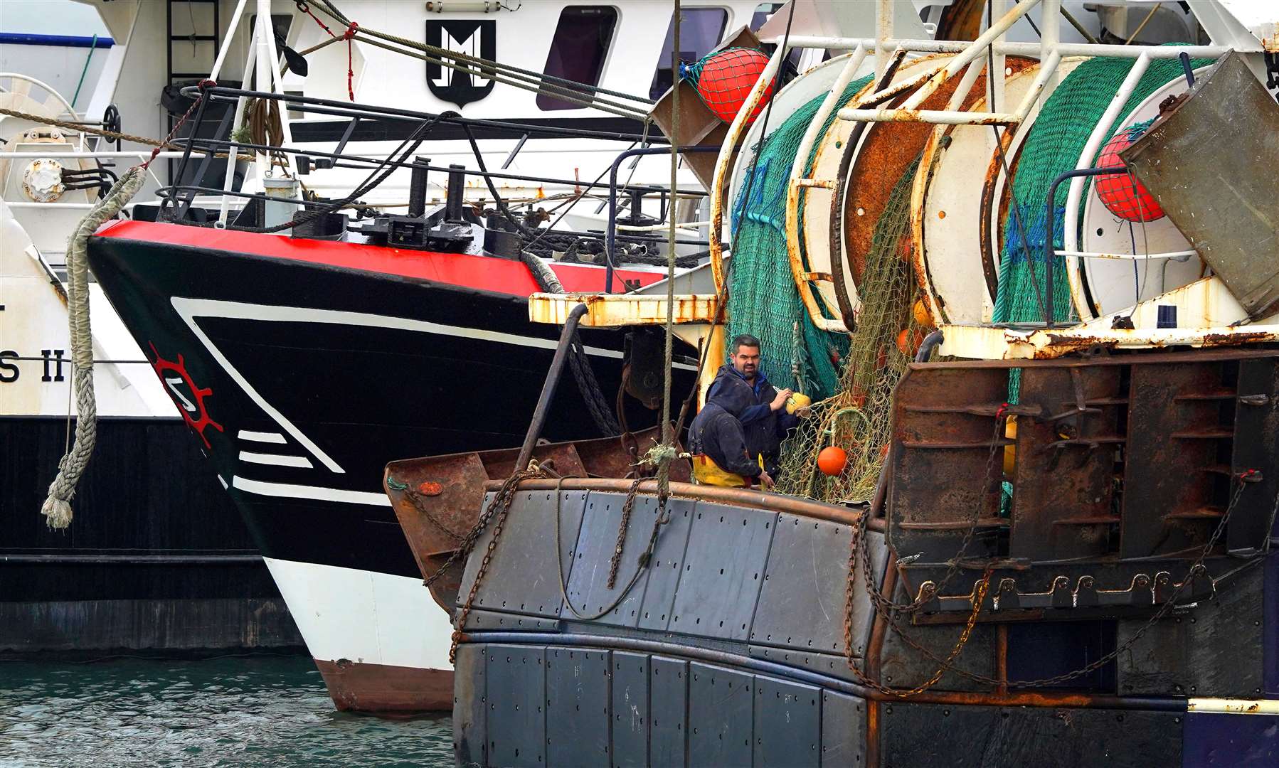 Fishing boats moored in the port of Boulogne, France (Gareth Fuller/PA)