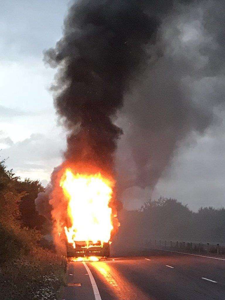 The bus was well alight, with a pall of smoke high above the road. Picture: @RachelFromow (4256423)