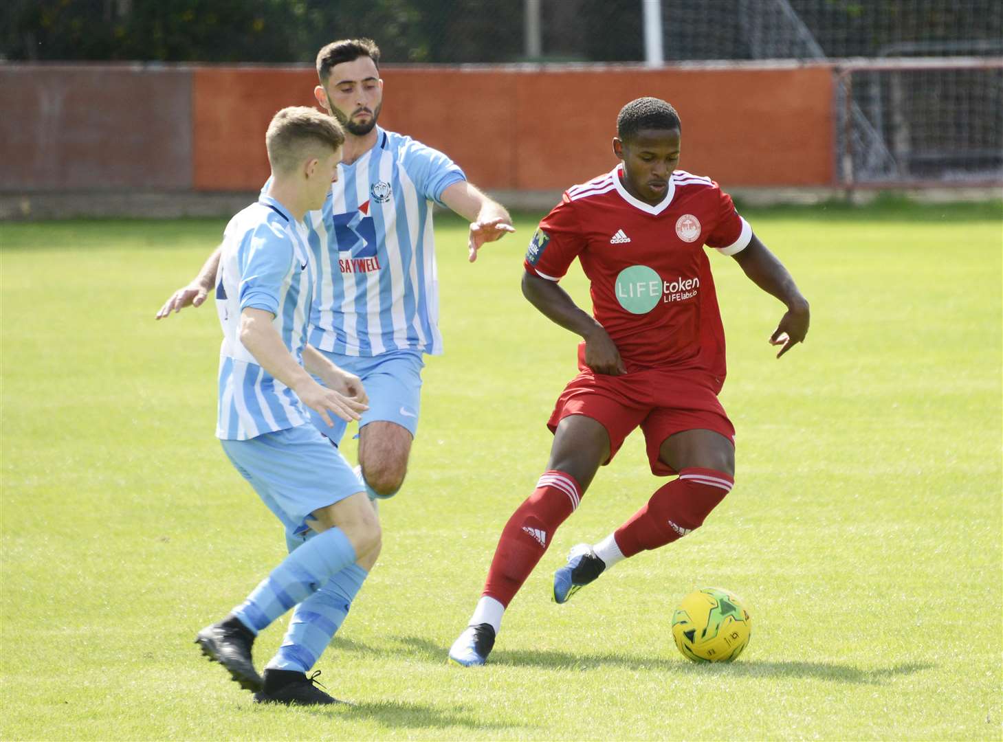 Hythe on their way to a 3-0 win over Worthing United in the preliminary round Picture: Paul Amos