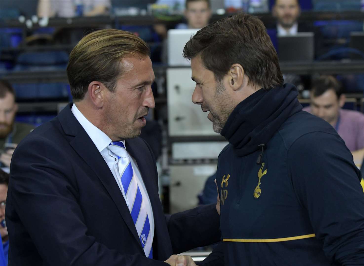 Justin Edinburgh shakes hands with Spurs manager Mauricio Pochettino back in 2016 when the Gills took on Tottenham Hotspur in the EFL Cup at White Hart Lane Picture: Barry Goodwin