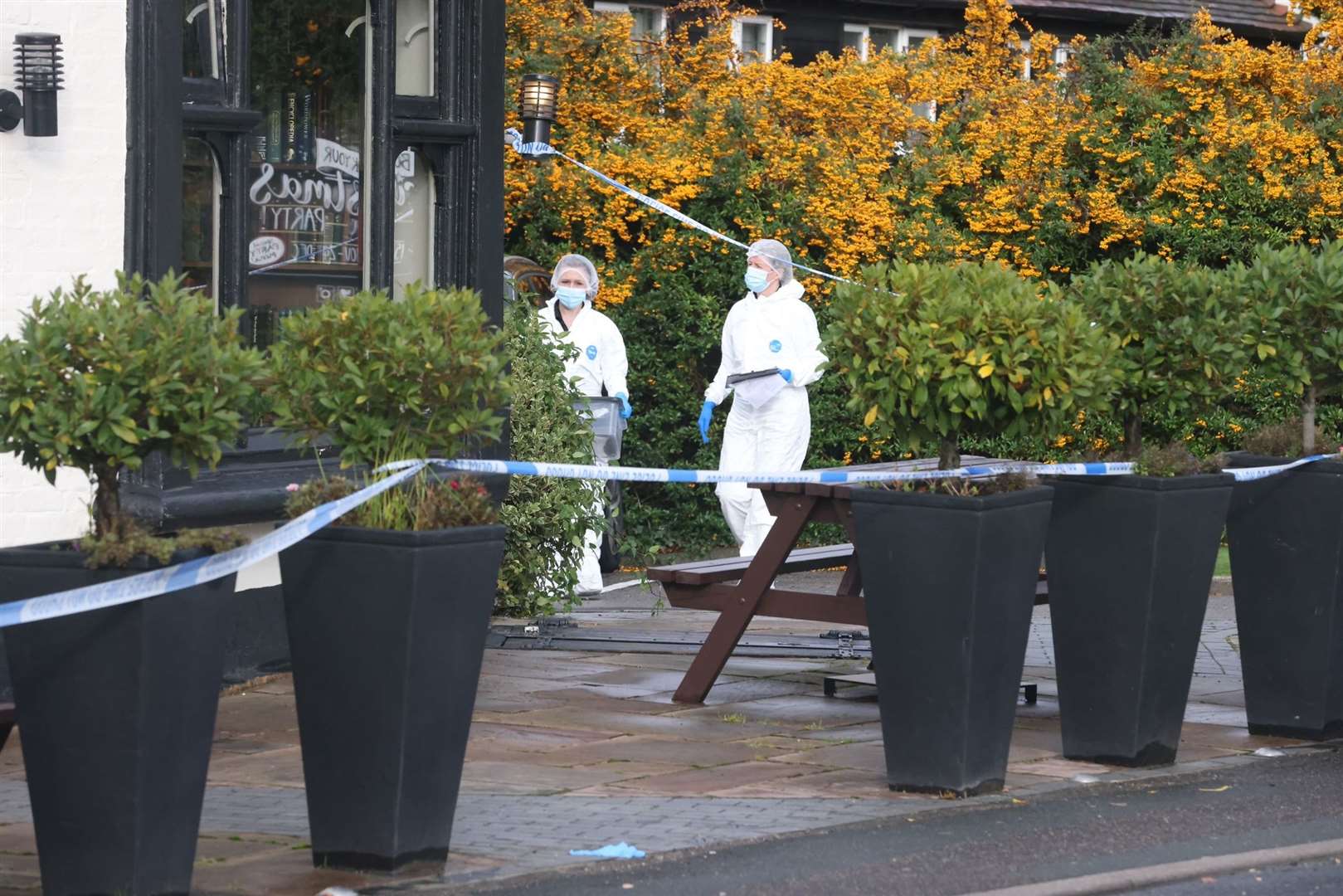 Forensics officers at the Cricketers Inn pub in Meopham. Picture: UKNIP