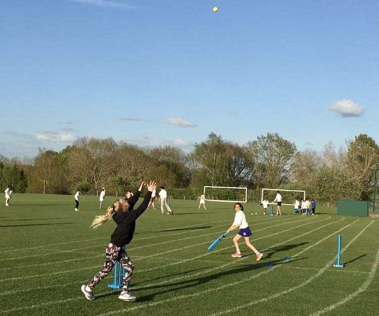 Youngsters enjoying the game of cricket at Somerhill School