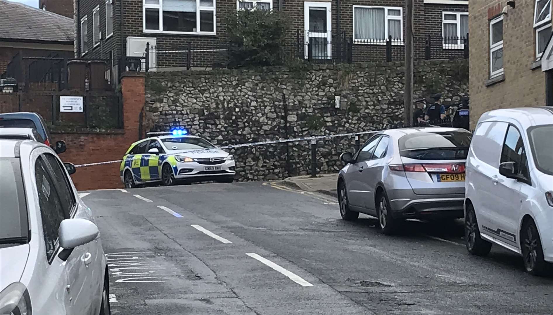 Officers were seen at the junction of Delce Road and Foord Street on the day Mr Chapman's body was found