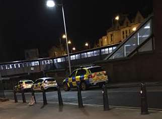 Police vehicles outside Gillingham station