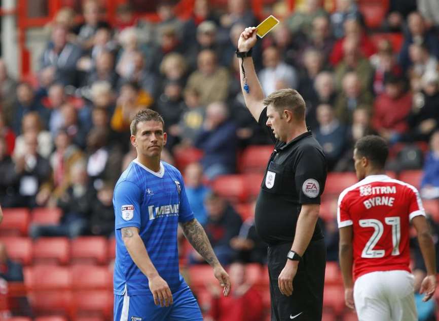 Cody McDonald is booked for diving Picture: Andy Jones