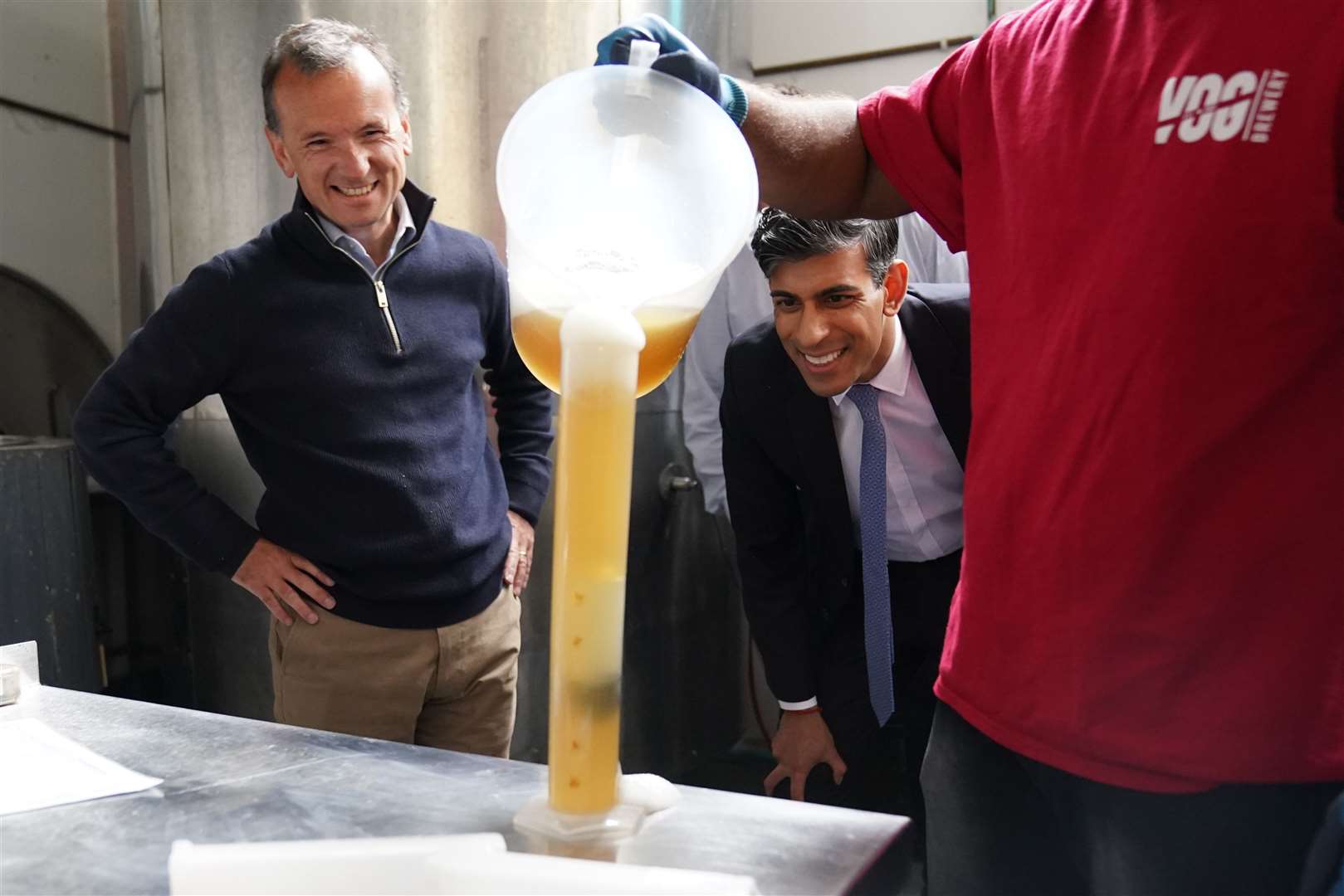 Teetotaller Rishi Sunak watching beer production at the Vale of Glamorgan Brewery in South Wales (Stefan Rousseau/PA)