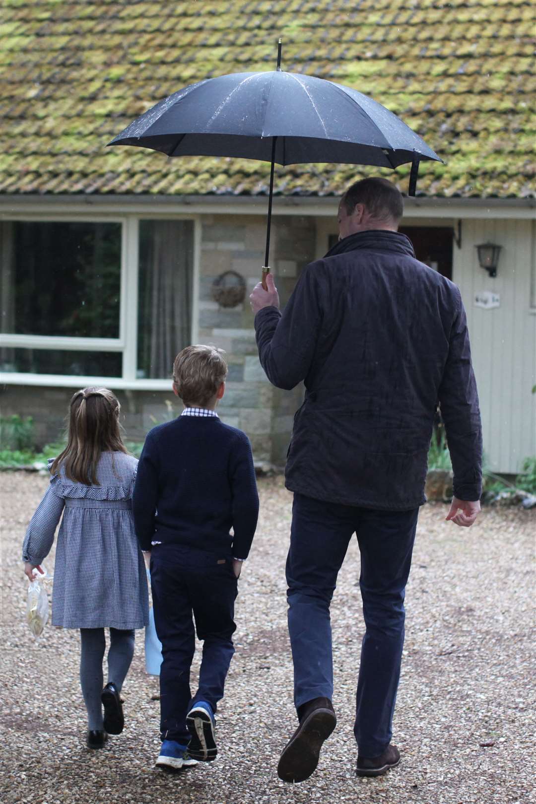 William, George and Charlotte pack up and deliver food packages for isolated pensioners in the local Sandringham area (The Duchess of Cambridge/PA)