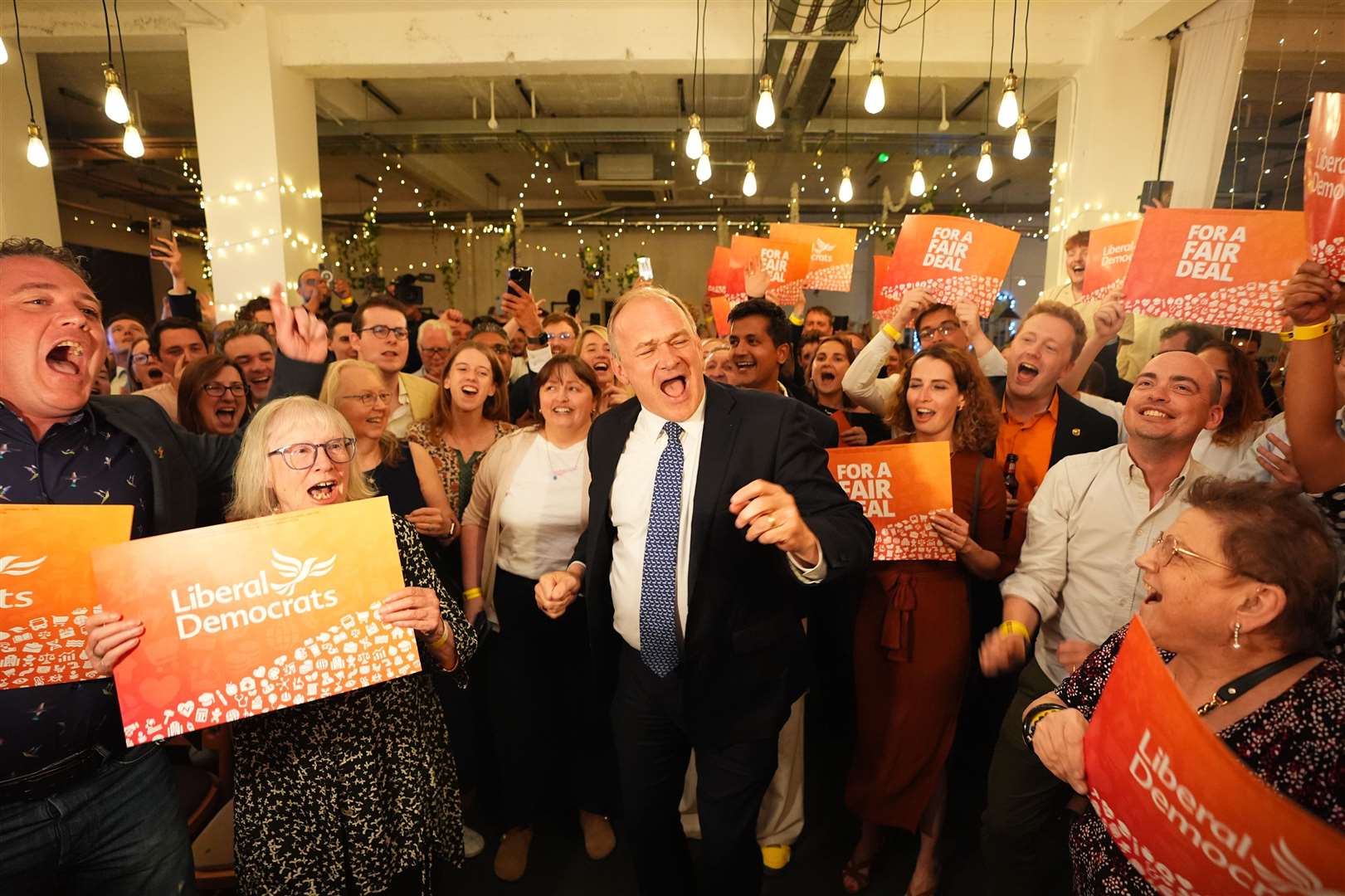 Liberal Democrat leader Sir Ed Davey celebrates at the London Art Bar (James Manning/PA)