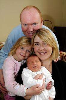 Lygo family, with new born baby son Rex four days old.Faye and Carl Lygo with Scarlet four and Rex